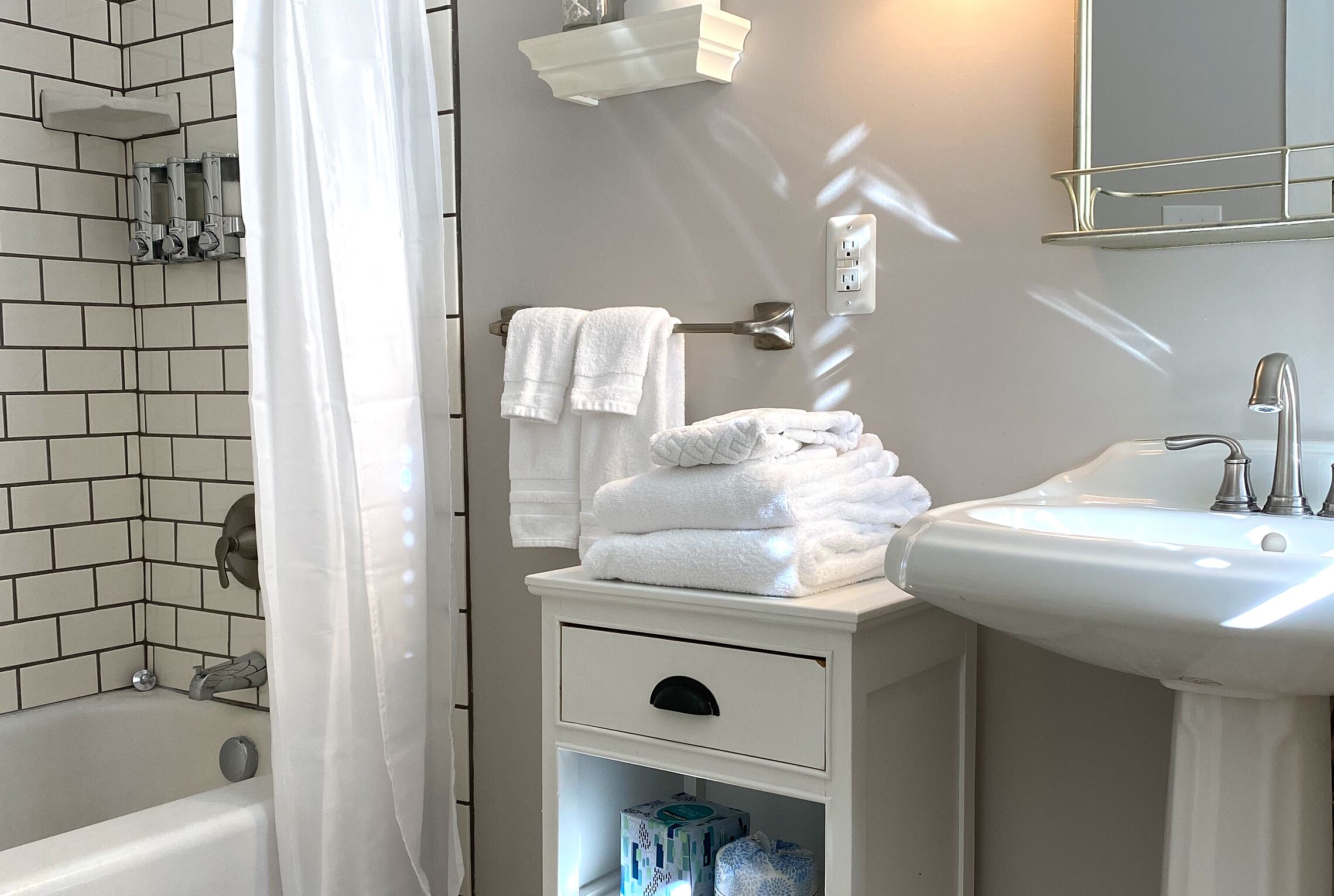 room, 1 queen bed (the tucker) | bathroom | designer toiletries, hair dryer, towels, soap