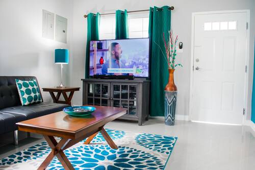 50-inch flat-screen TV with cable channels, TV, DVD player