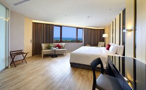Habitació doble Deluxe | Roba de llit d'alta qualitat, caixa forta a l'habitació i escriptori