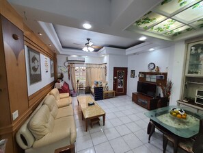 Family Villa (Holiday Home, 5 Rooms) | Living area | 32-inch flat-screen TV with cable channels, TV - Dongshan River Left bank B&B (Wujie)