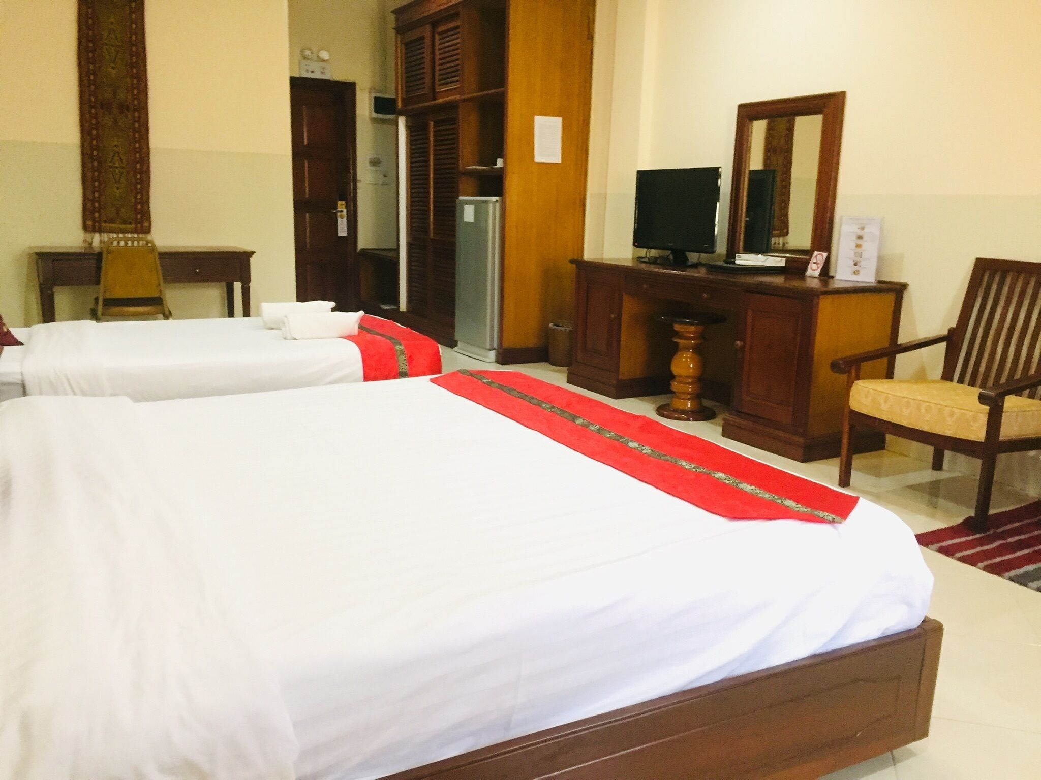 family room | 1 bedroom, minibar, in-room safe, desk