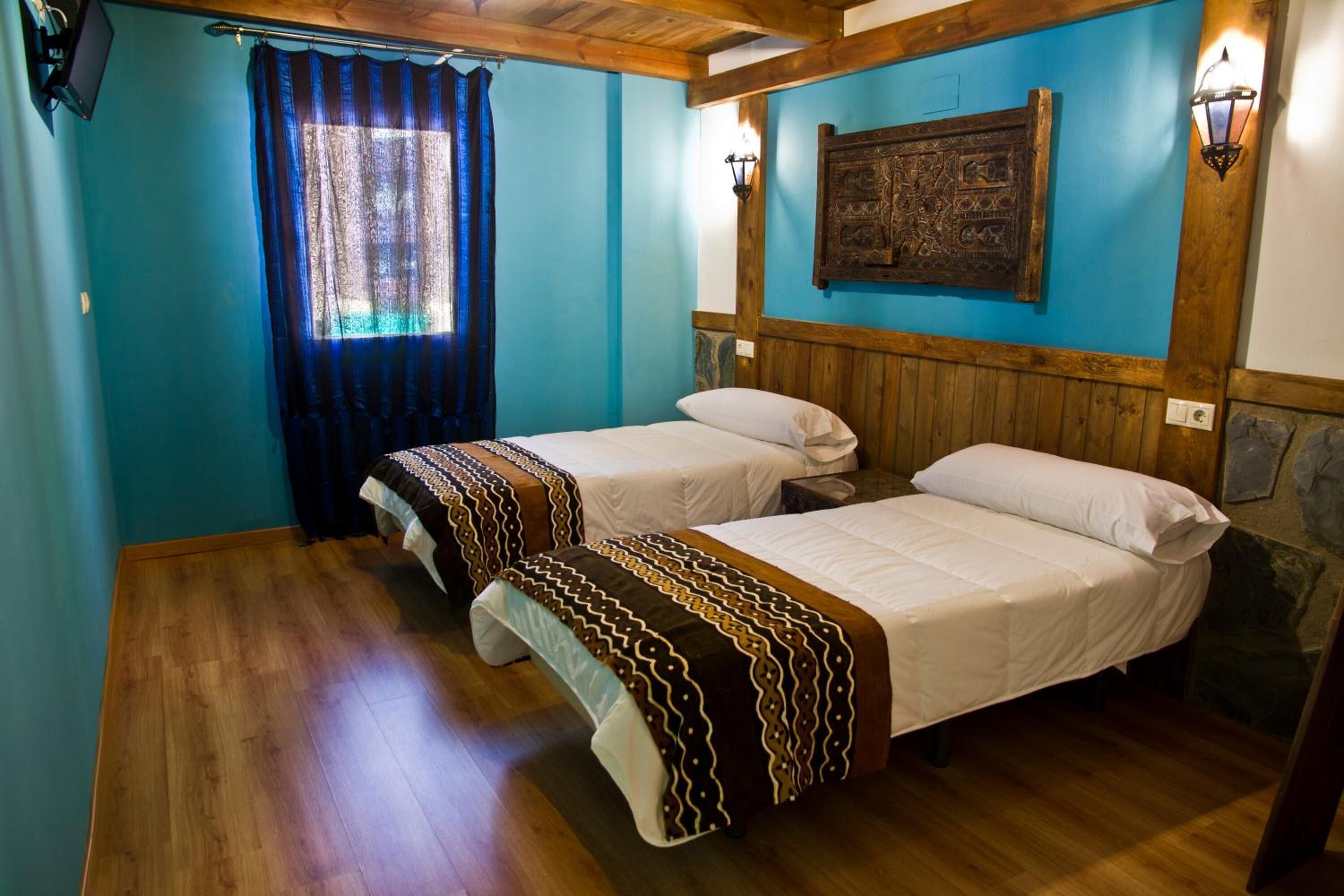 individually decorated, individually furnished, desk, blackout curtains