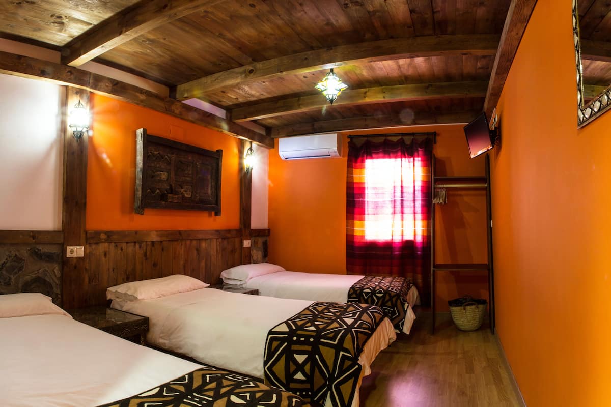 Standard Triple Room | Individually decorated, individually furnished, desk, blackout curtains