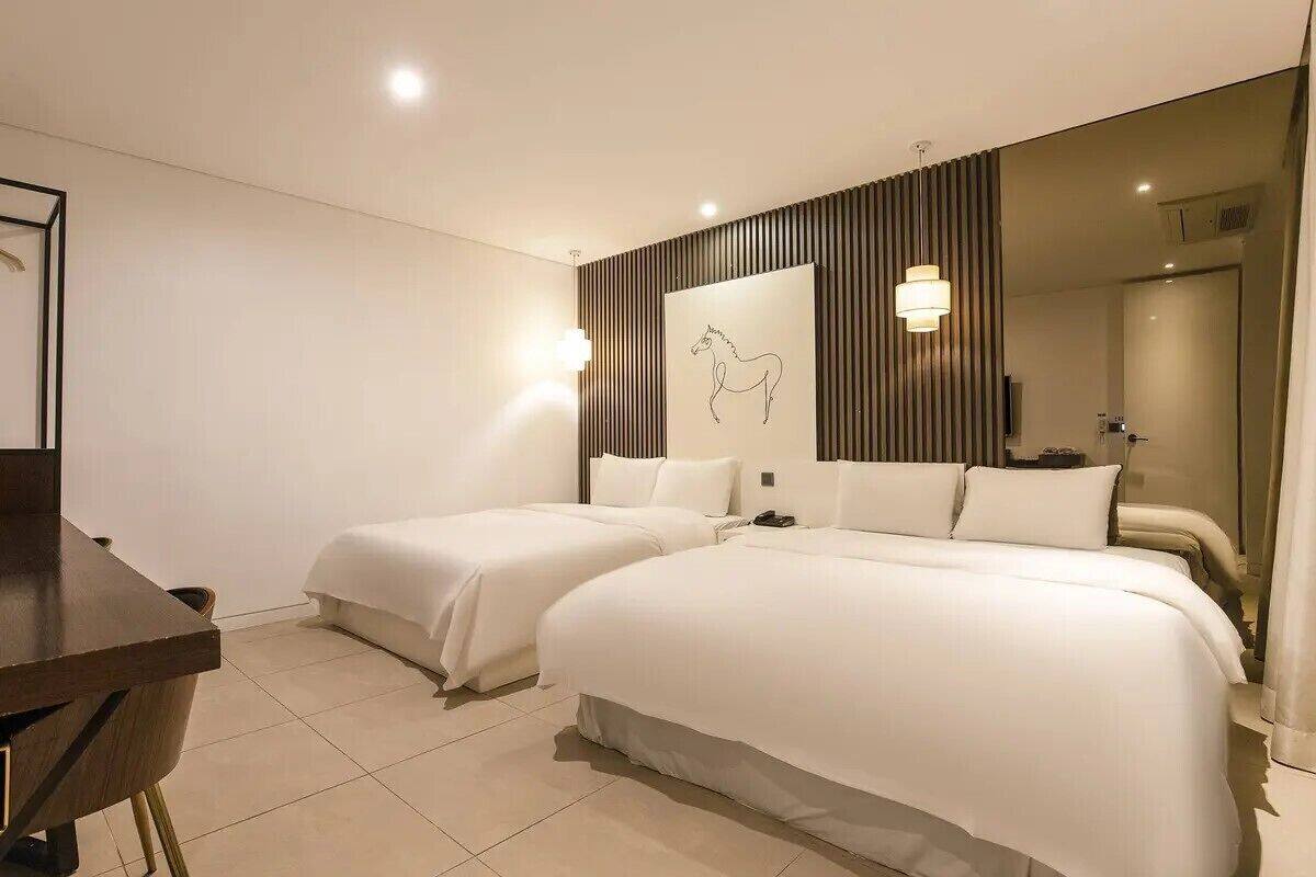Premium bedding, free minibar, desk, laptop workspace