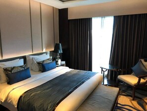 Premium Luxury Suite | Egyptian cotton sheets, premium bedding, down comforters - Pride Plaza Hotel Aerocity New Delhi (New Delhi)