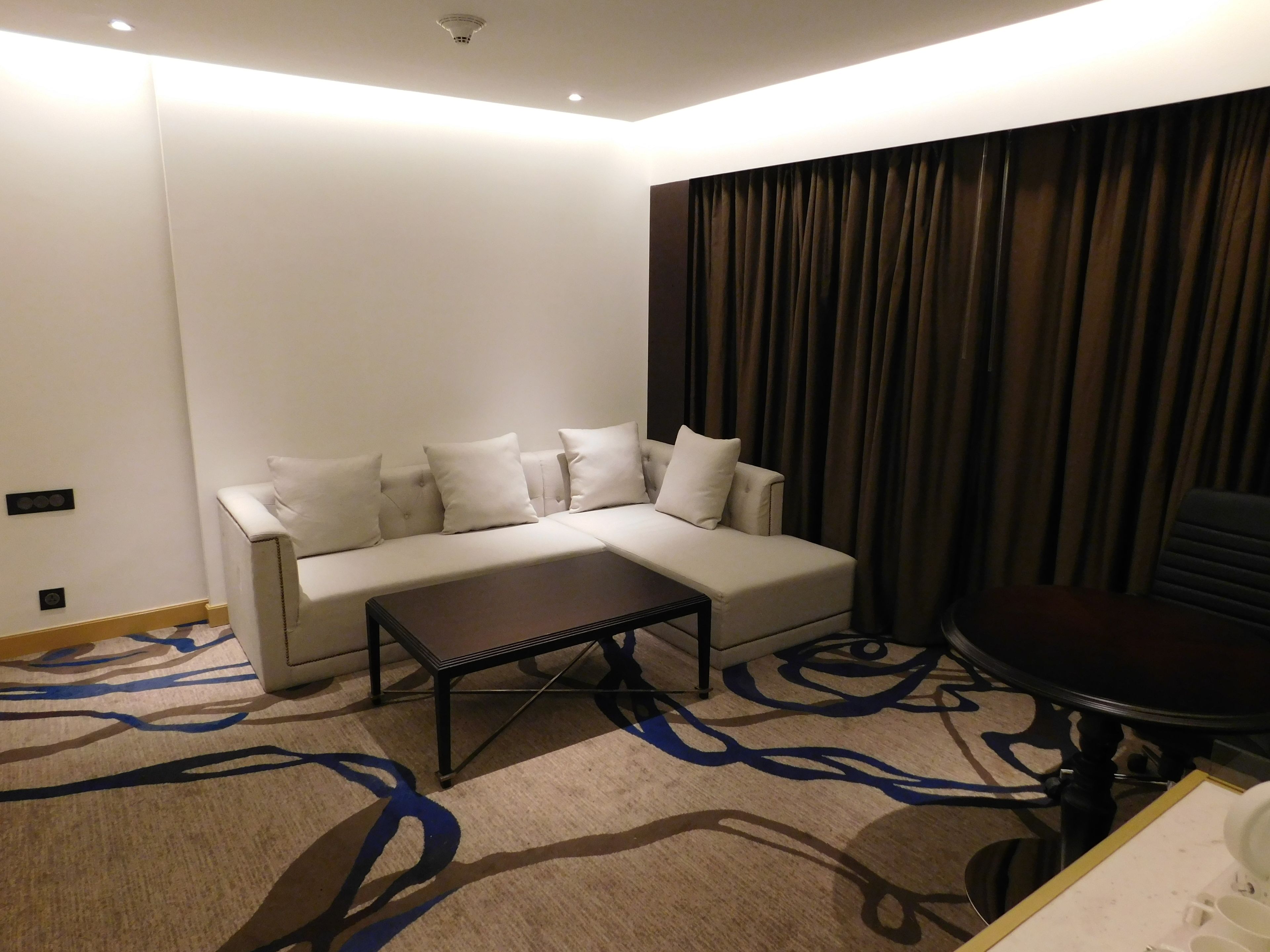 luxury suite | living area | 42-inch led tv with satellite channels, tv, fireplace