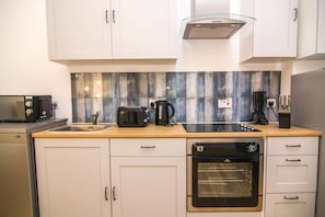 Lägenhet City - 2 sovrum | Eget kök | Mikrovågsugn, ugn, spishäll och vattenkokare