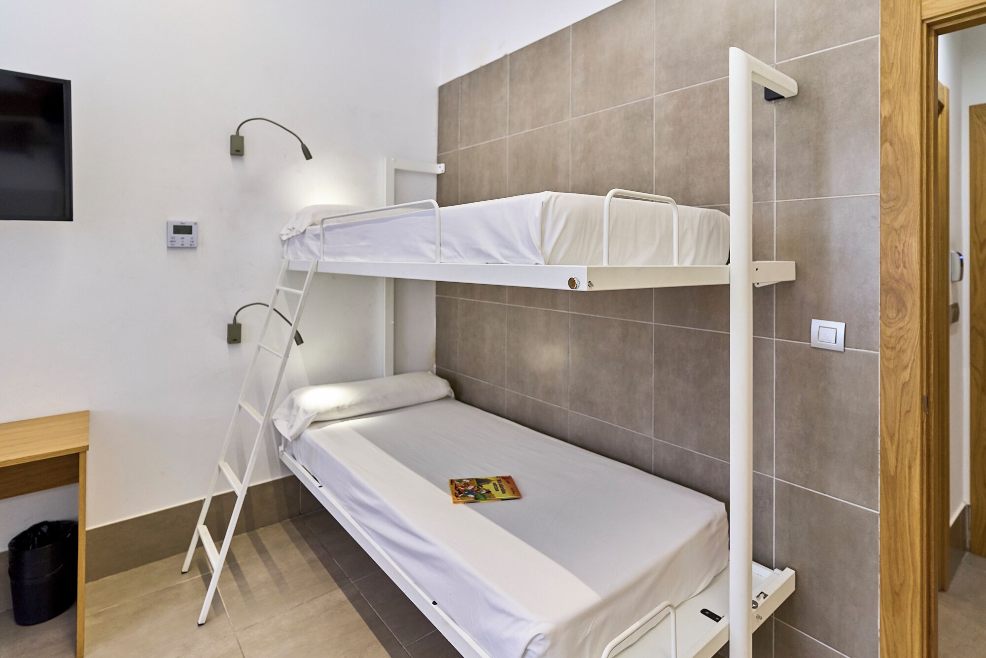 Foto - The Book Factory Hostel by gaiarooms