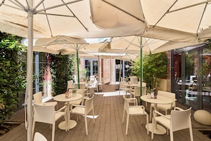 Breakfast, lunch served; Mediterranean cuisine, al fresco dining
