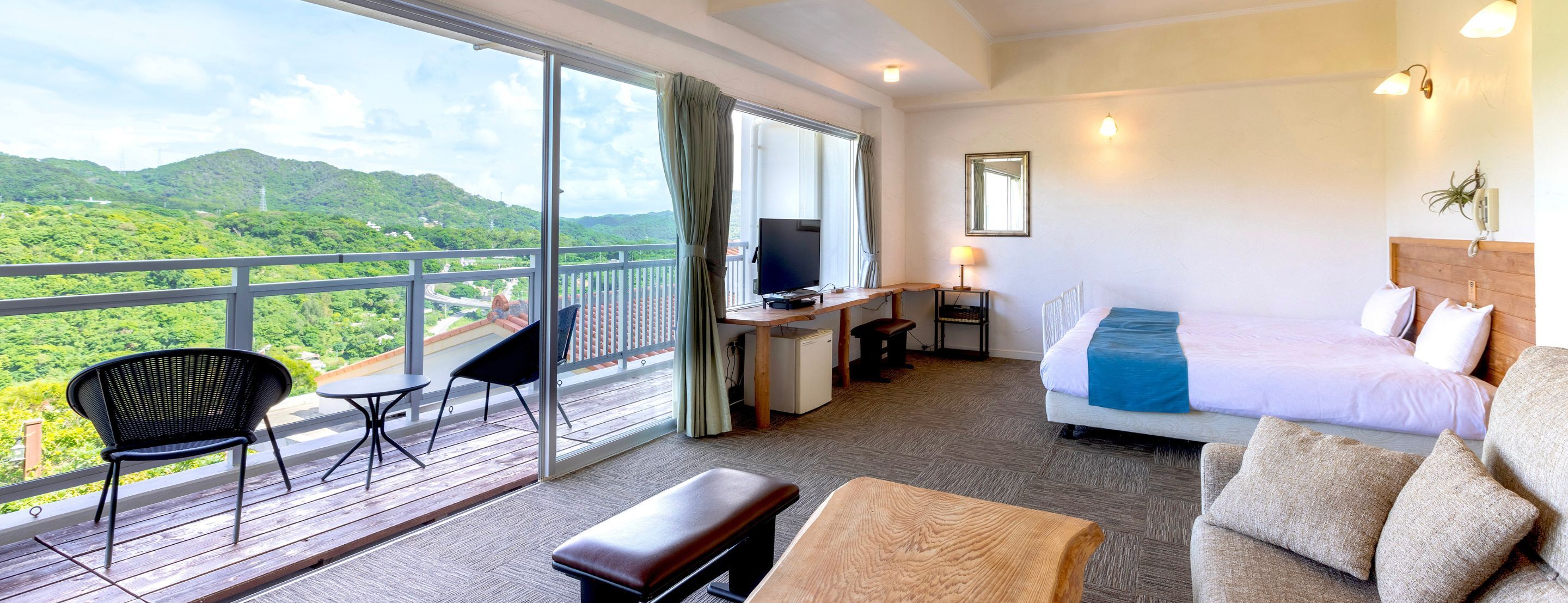 deluxe twin room, mountain view | individually decorated, desk, laptop workspace, blackout curtains