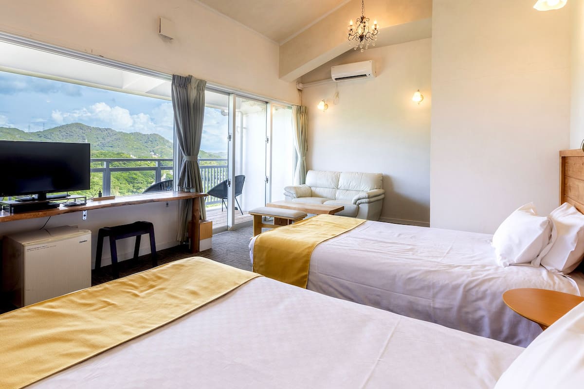 standard twin room, mountain view | individually decorated, desk, laptop workspace, blackout curtains