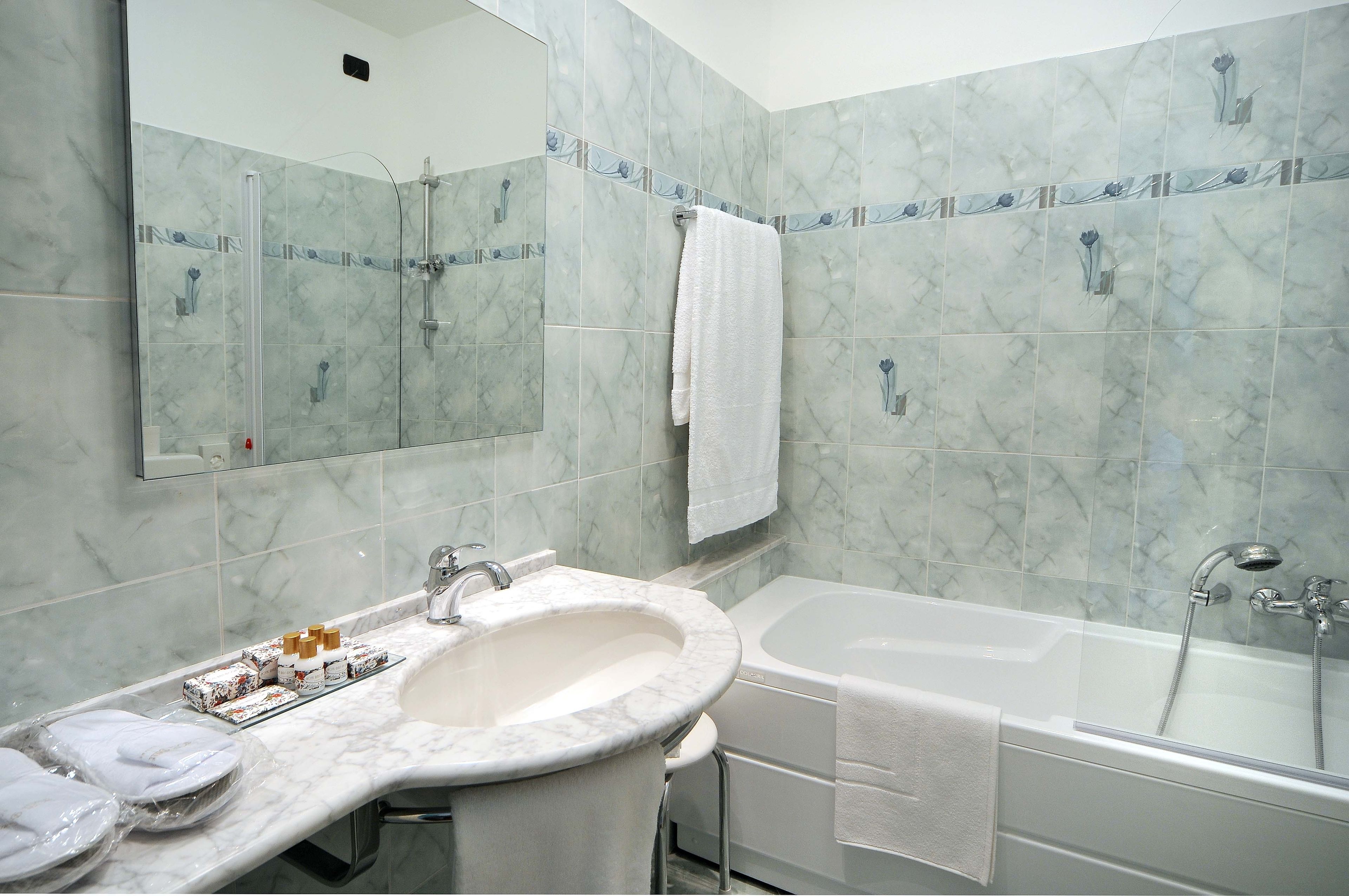 free toiletries, hair dryer, slippers, bidet