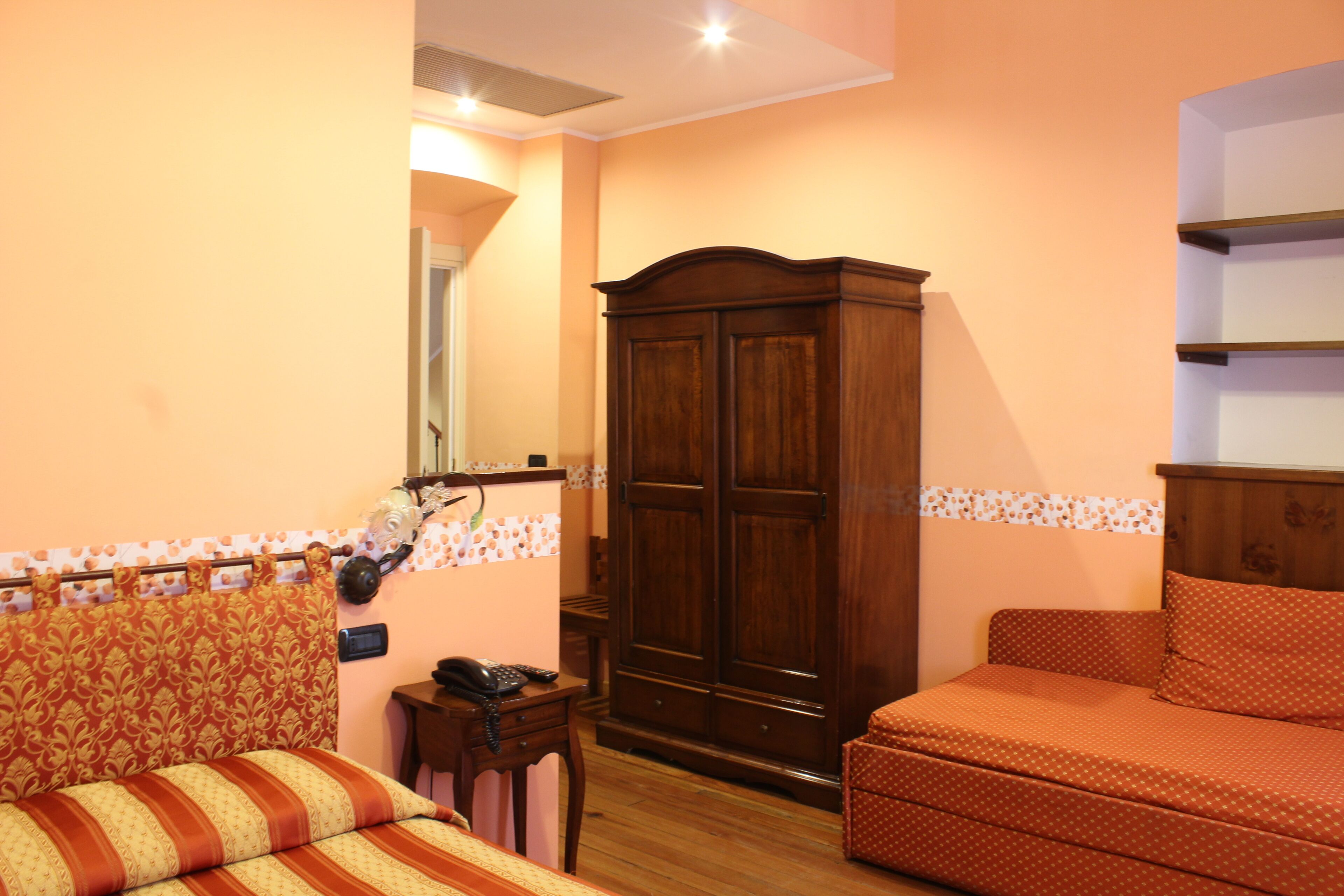 family quadruple room, non smoking, city view | 1 bedroom, premium bedding, minibar, in-room safe