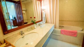 Combined shower/tub, free toiletries, hair dryer, bathrobes