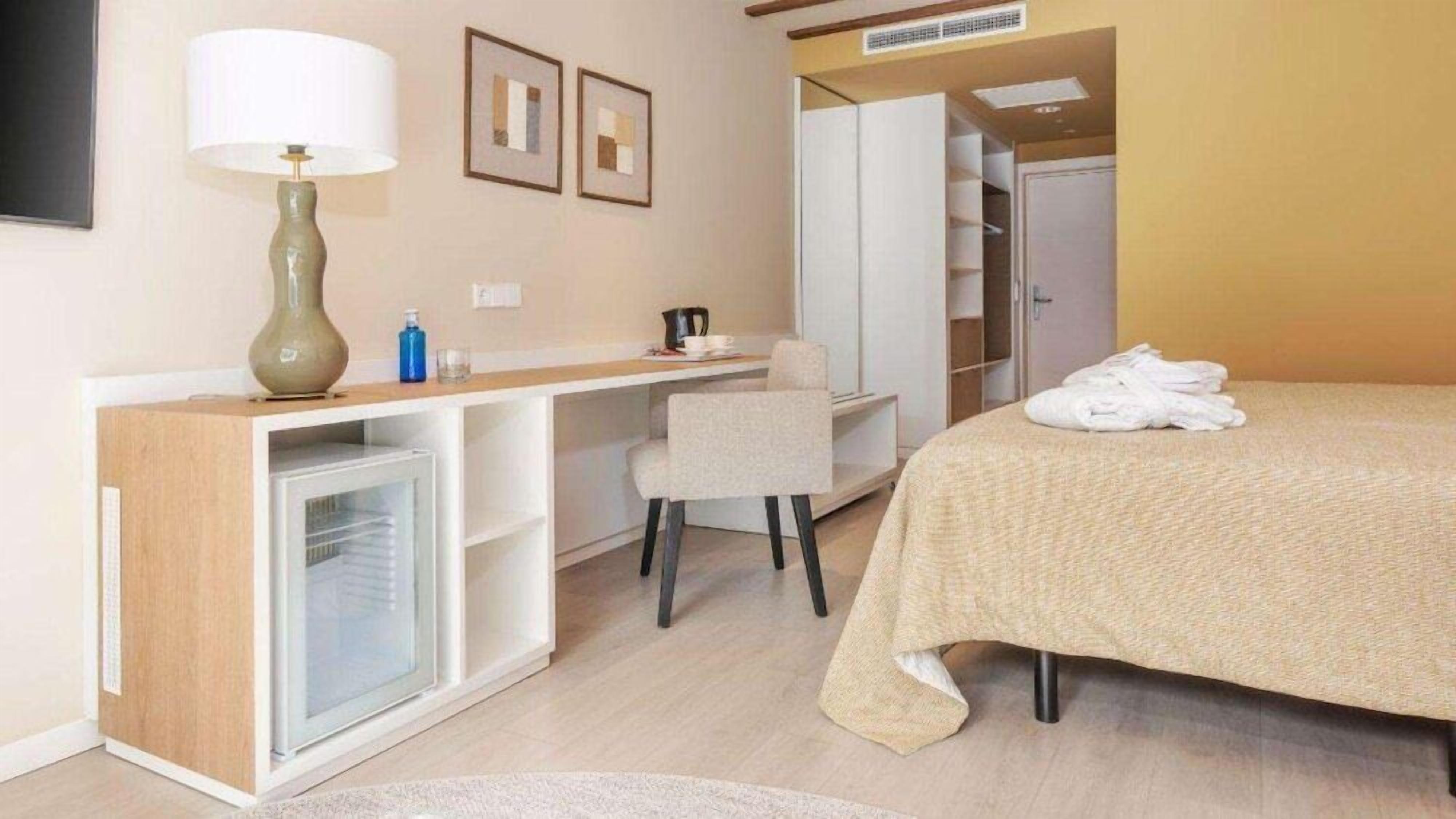 Minibar, desk, blackout drapes, free WiFi