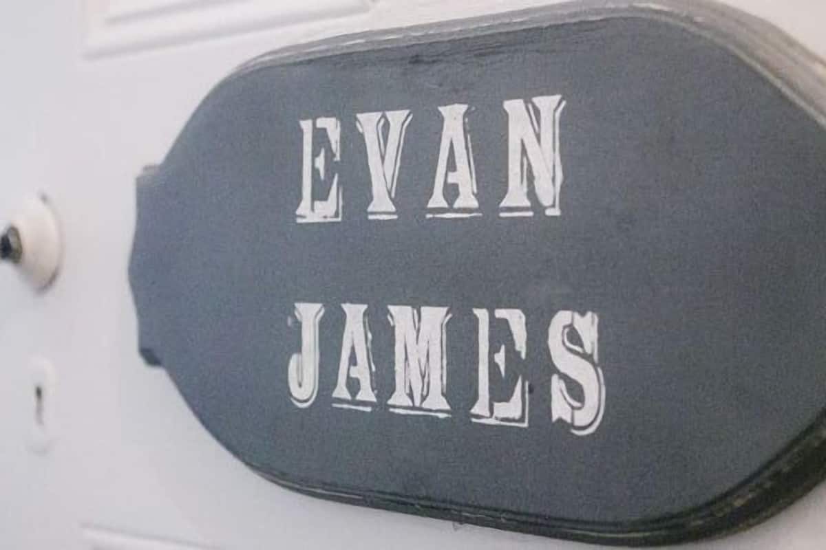 A door with a nameplate reading "EVAN JAMES".