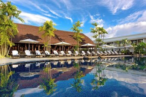 Outdoor pool, open 6:00 AM to 7:00 PM, pool loungers