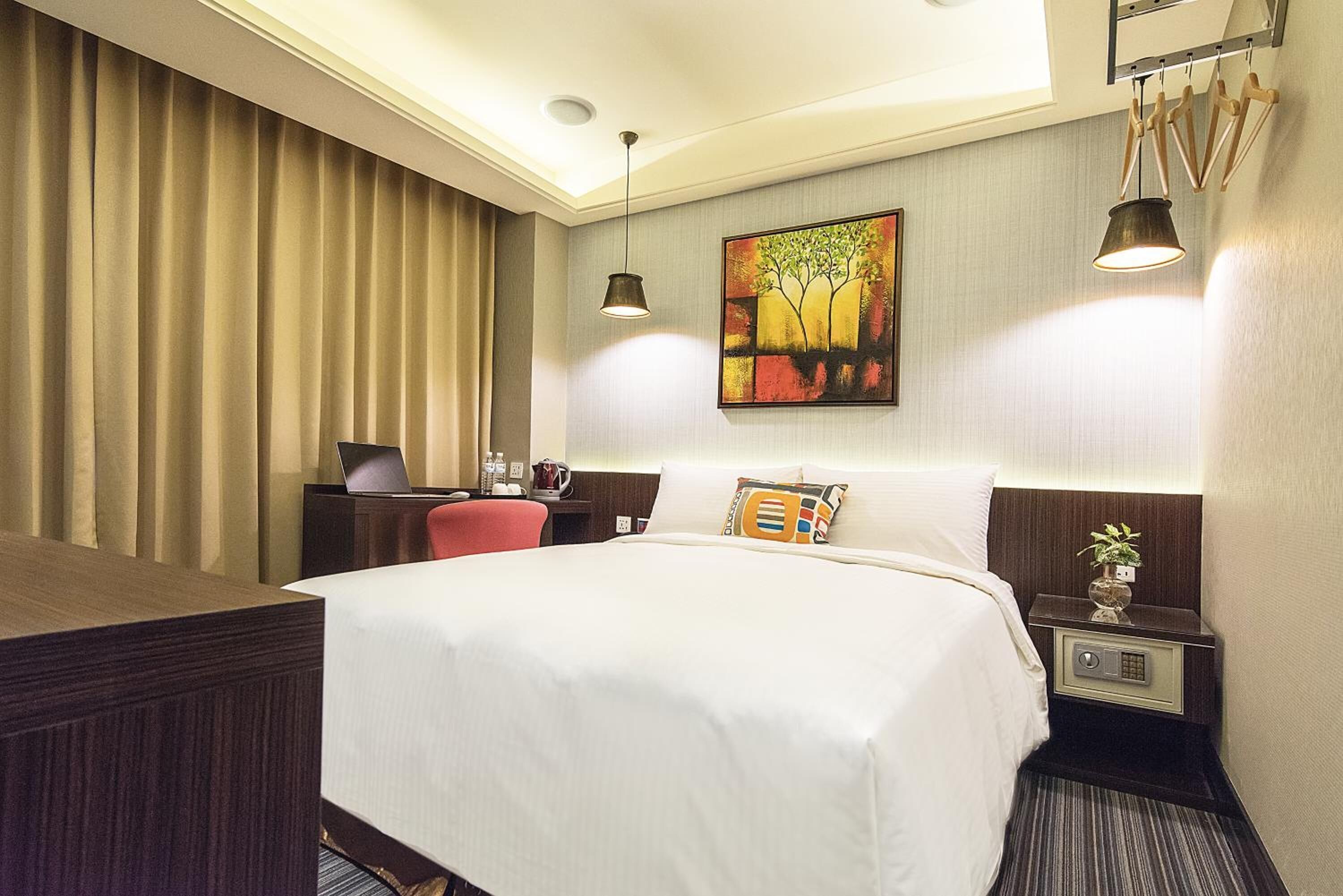 premium bedding, down duvets, pillow-top beds, in-room safe