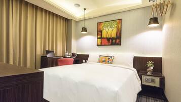 Premium bedding, down duvets, pillow-top beds, in-room safe