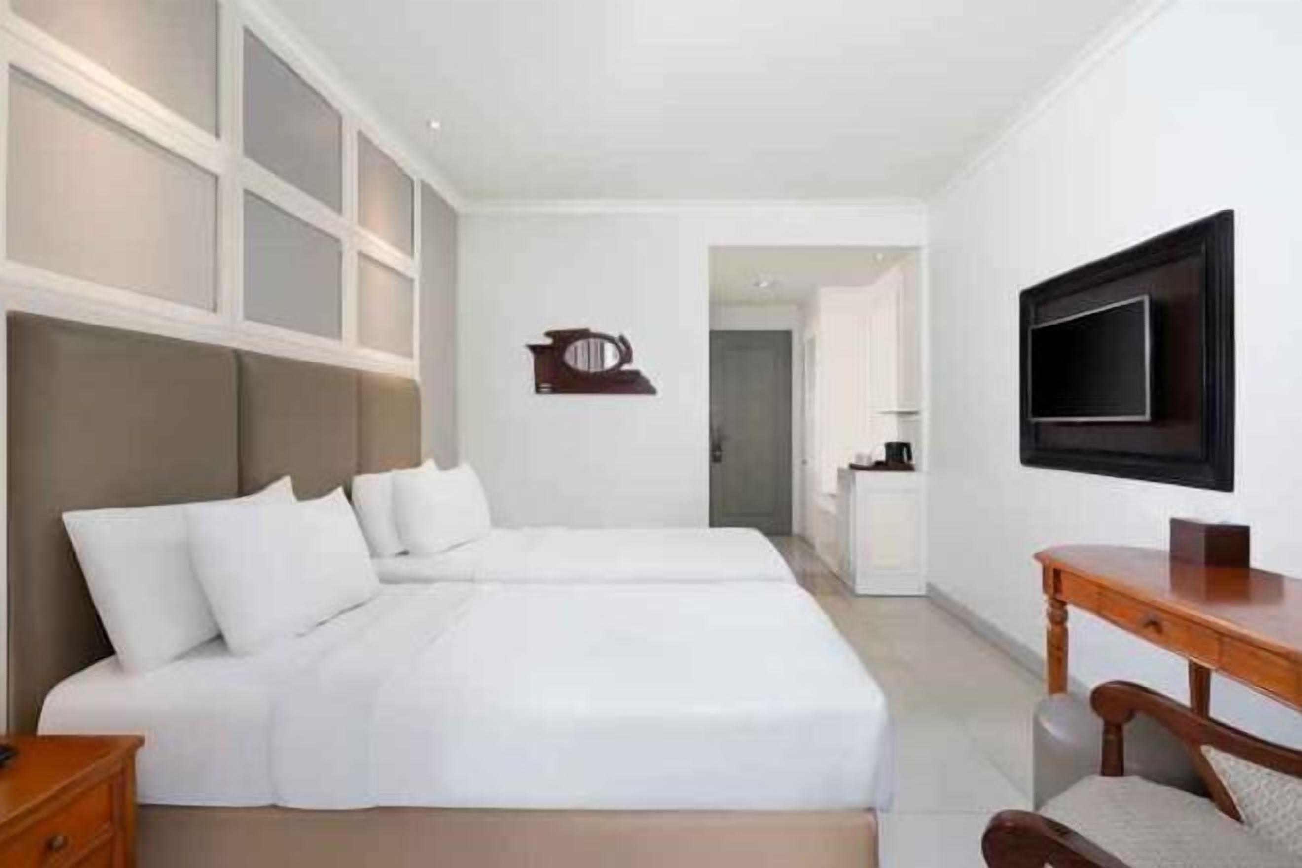 Literie de qualité supérieure, coffres-forts dans les chambres, bureau