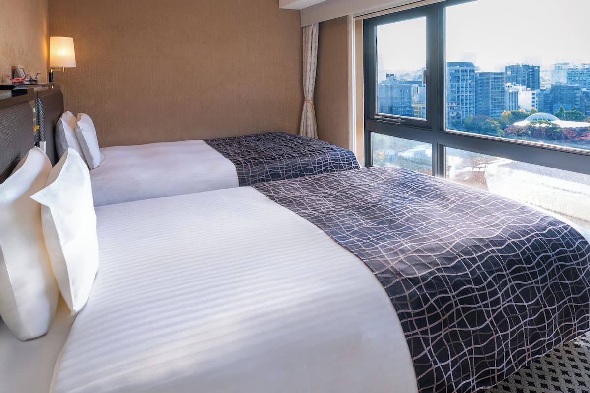 デラックス ツインルーム 2 ベッドルーム | 羽毛の掛け布団、デスク、ノートパソコン用作業スペース、防音設備