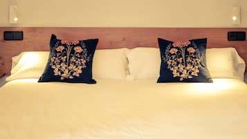Blackout curtains, iron/ironing board, free cots/infant beds, travel cot
