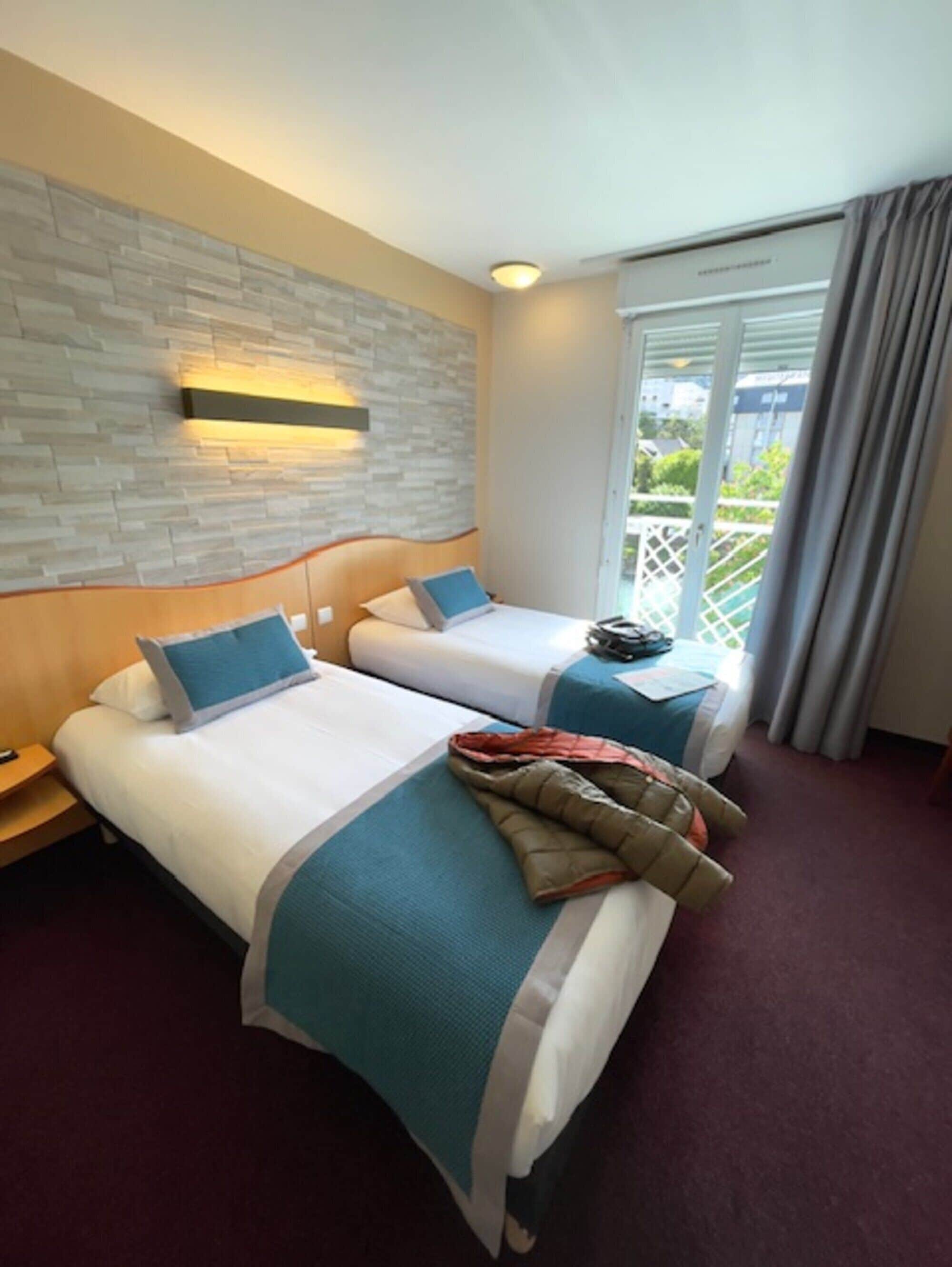 Premium bedding, desk, iron/ironing board, rollaway beds