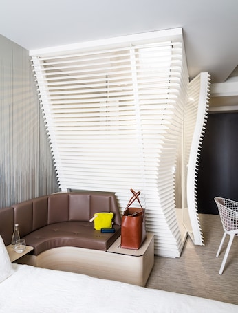 Premium bedding, down comforters, in-room safe, desk. OKKO Hotels Cannes Centre