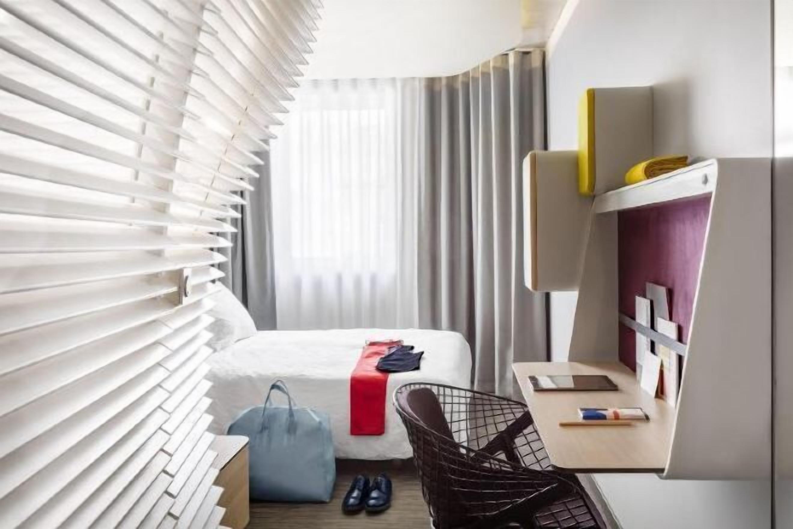 Premium bedding, down duvets, in-room safe, desk