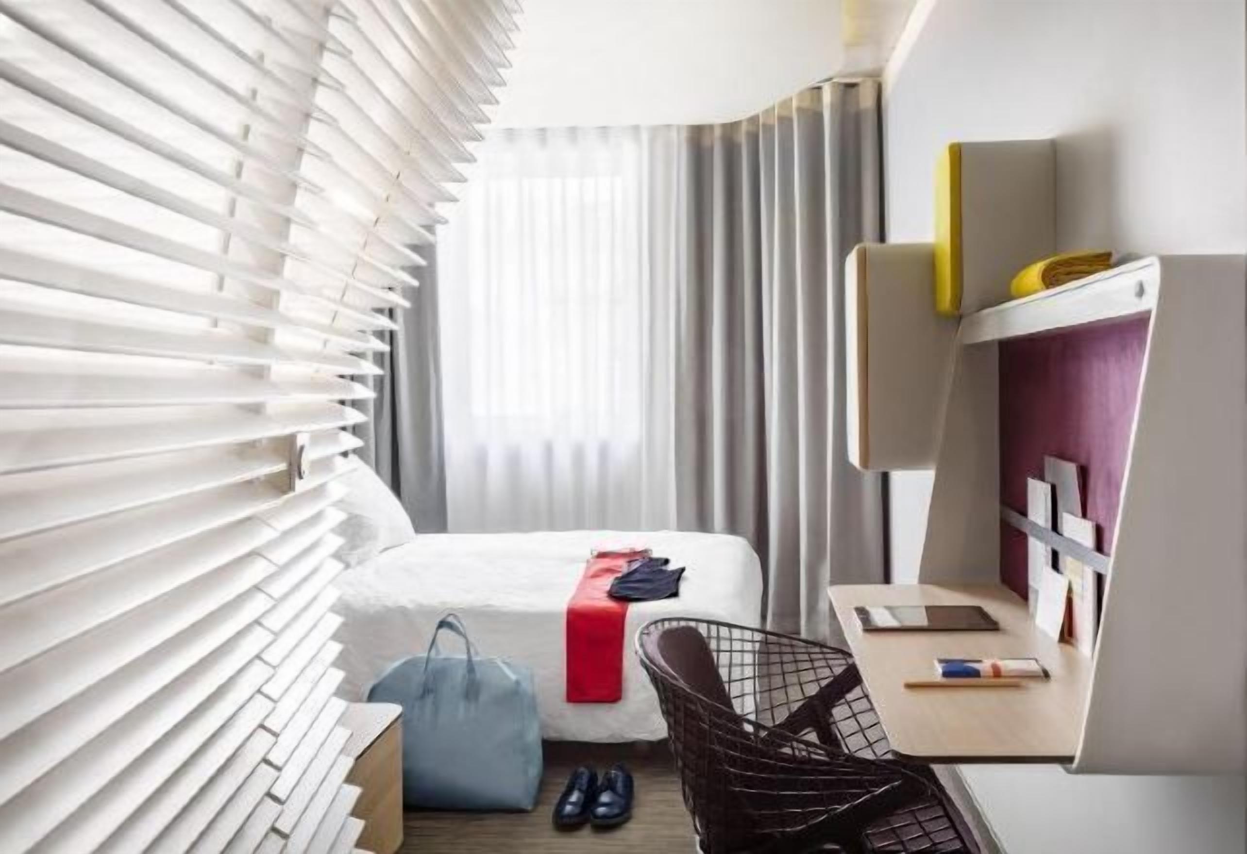 Premium bedding, down duvets, in-room safe, desk