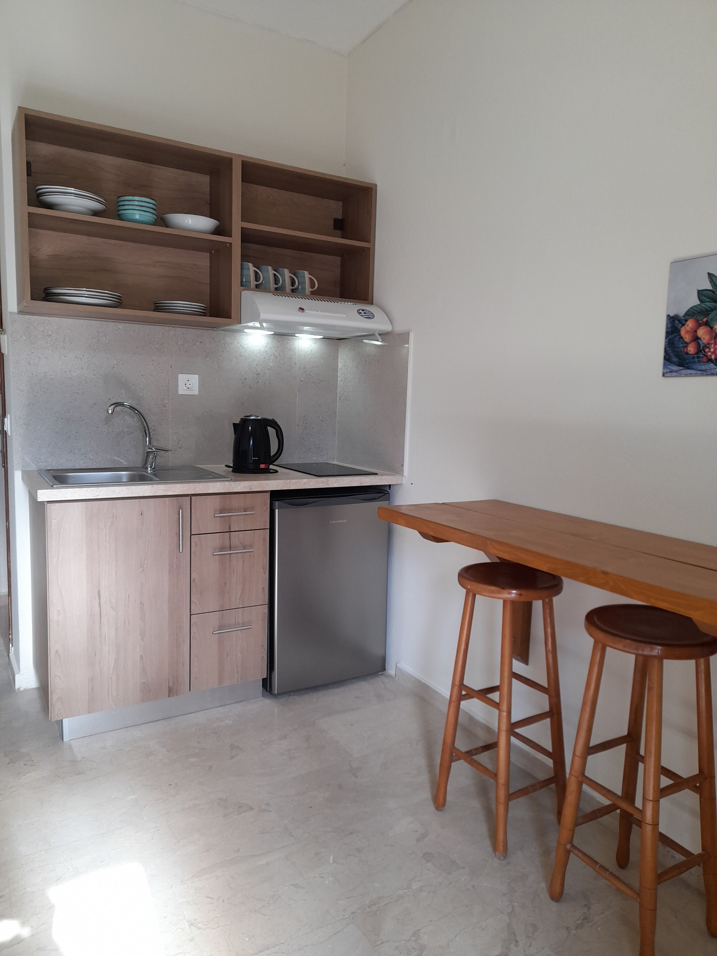 fridge, cleaning supplies, paper towels