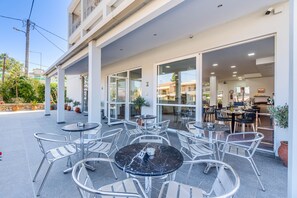 Breakfast, lunch, dinner served; international cuisine, pool views 