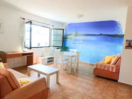 15-inch flat-screen TV with cable channels, TV