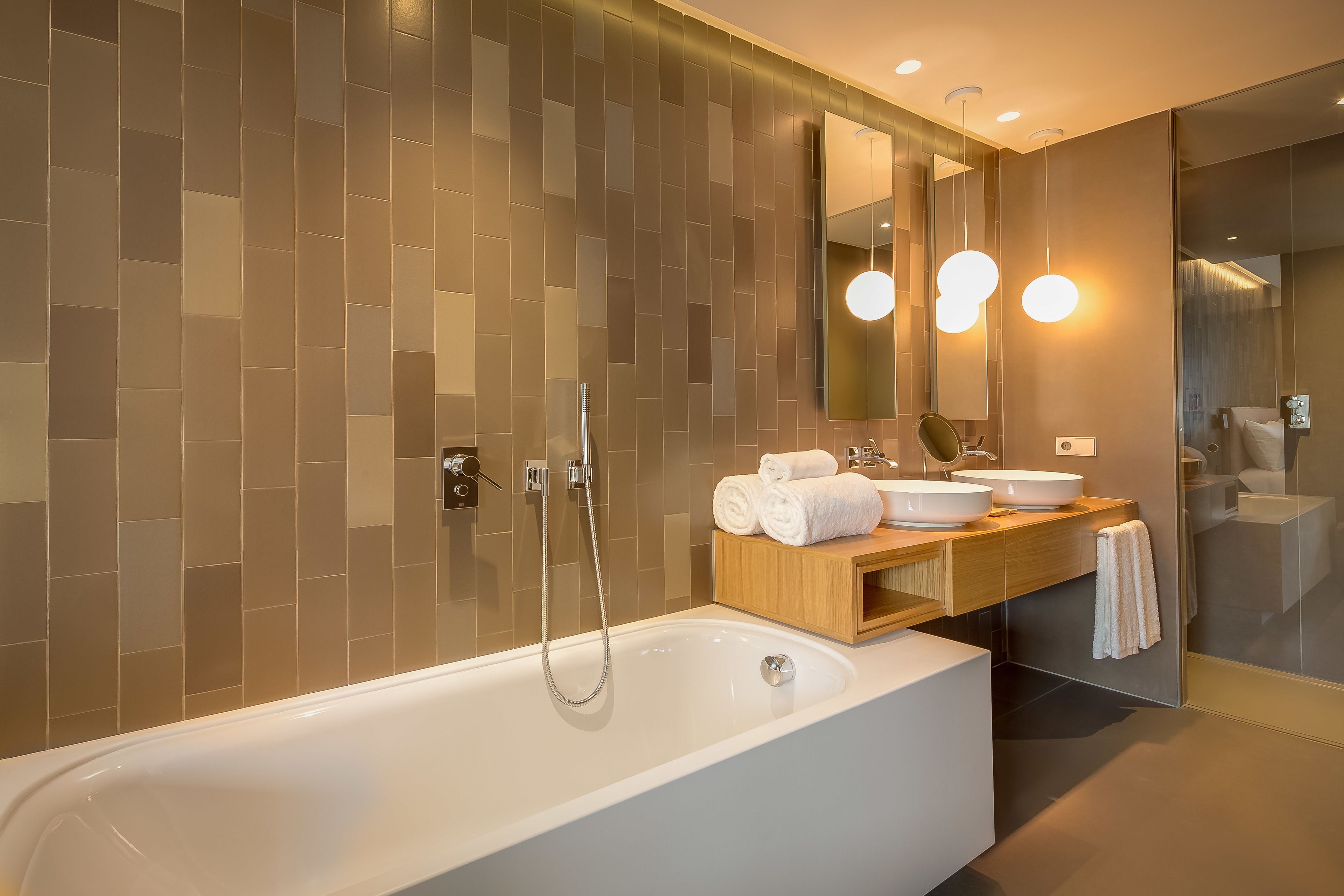 eco-friendly toiletries, hair dryer, bathrobes, slippers