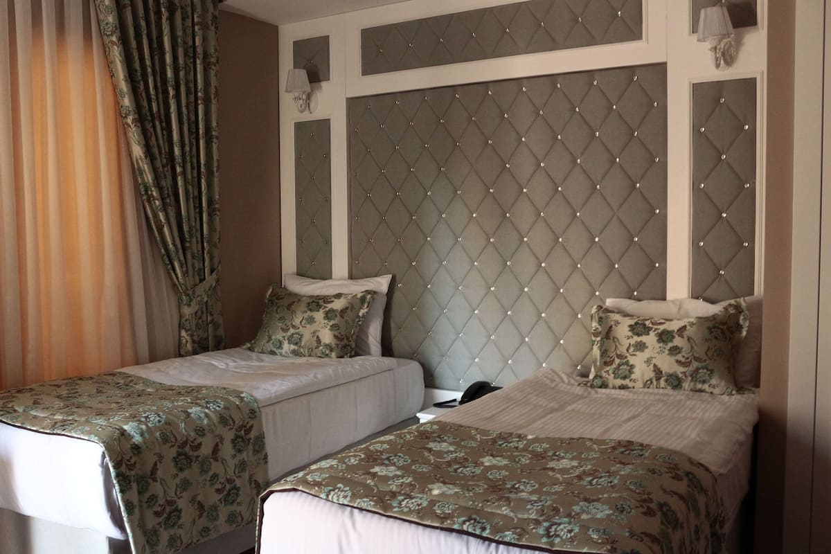 Family Deluxe Room | Hochwertige Bettwaren, Minibar, Zimmersafe, Schreibtisch