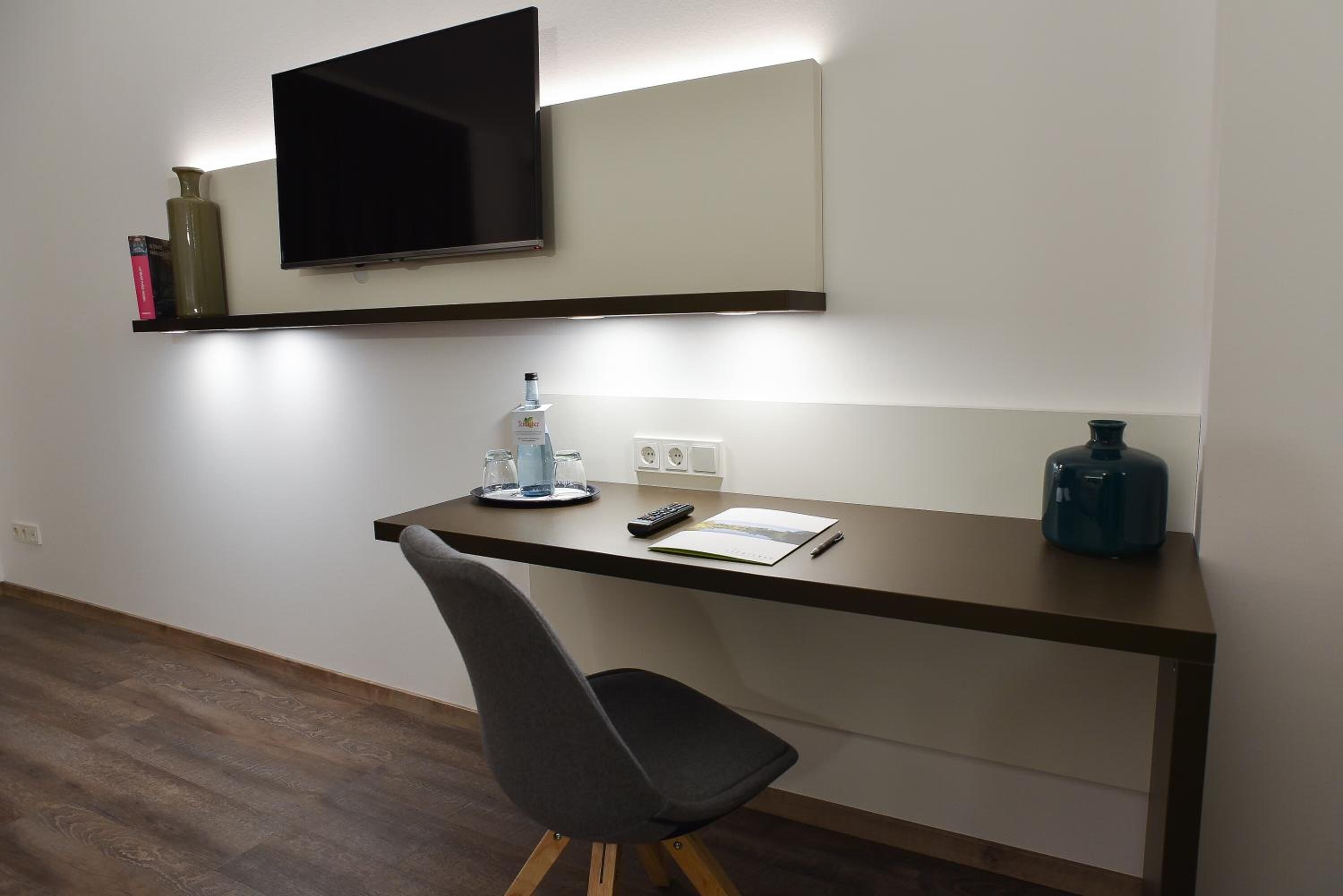 desk, blackout curtains, soundproofing, cots/infant beds