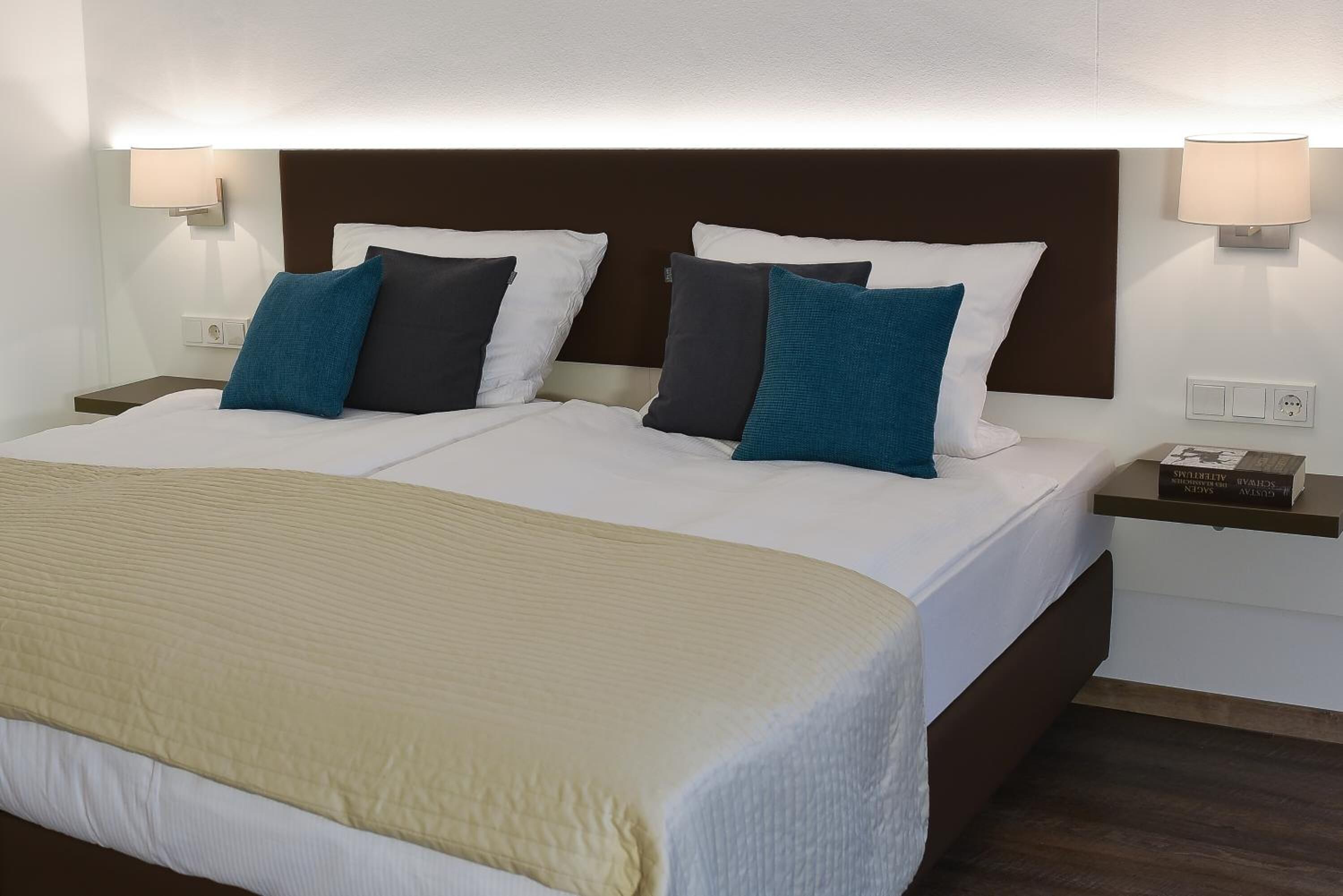 desk, blackout curtains, soundproofing, cots/infant beds