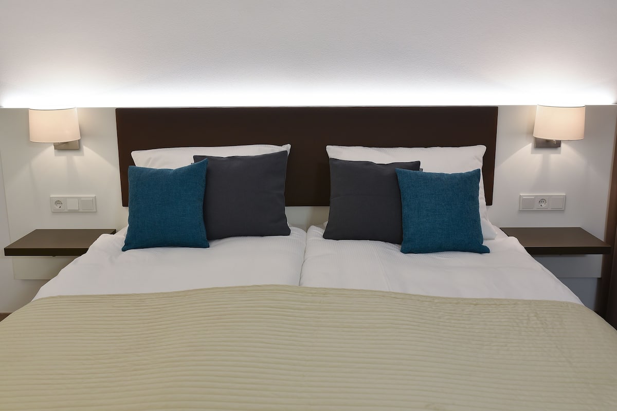 comfort double room | desk, blackout curtains, soundproofing, cots/infant beds