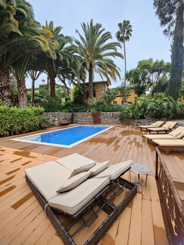 Outdoor pool, pool umbrellas, pool loungers