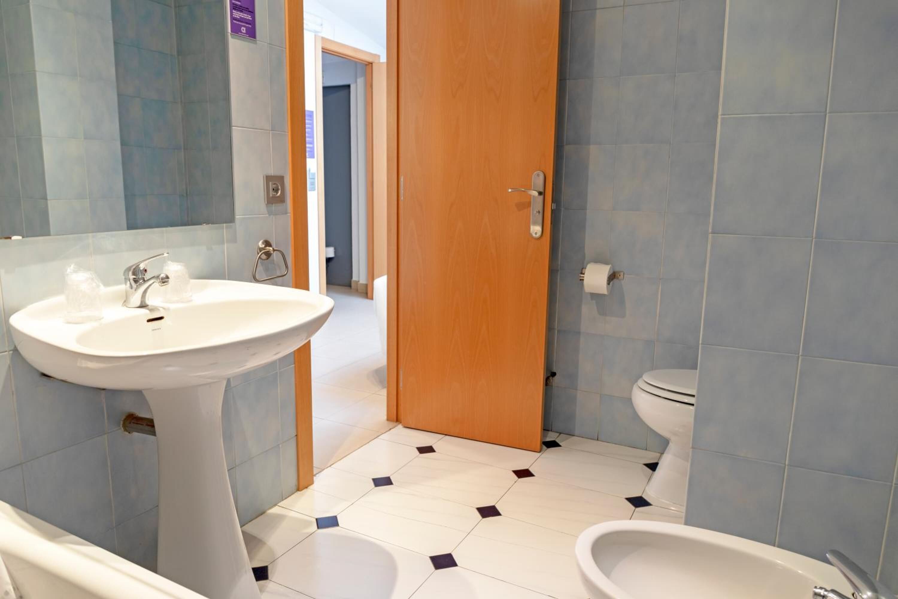 deep-soaking bathtub, free toiletries, hair dryer, towels