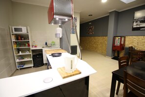 Fridge, microwave, cookware/dishes/utensils