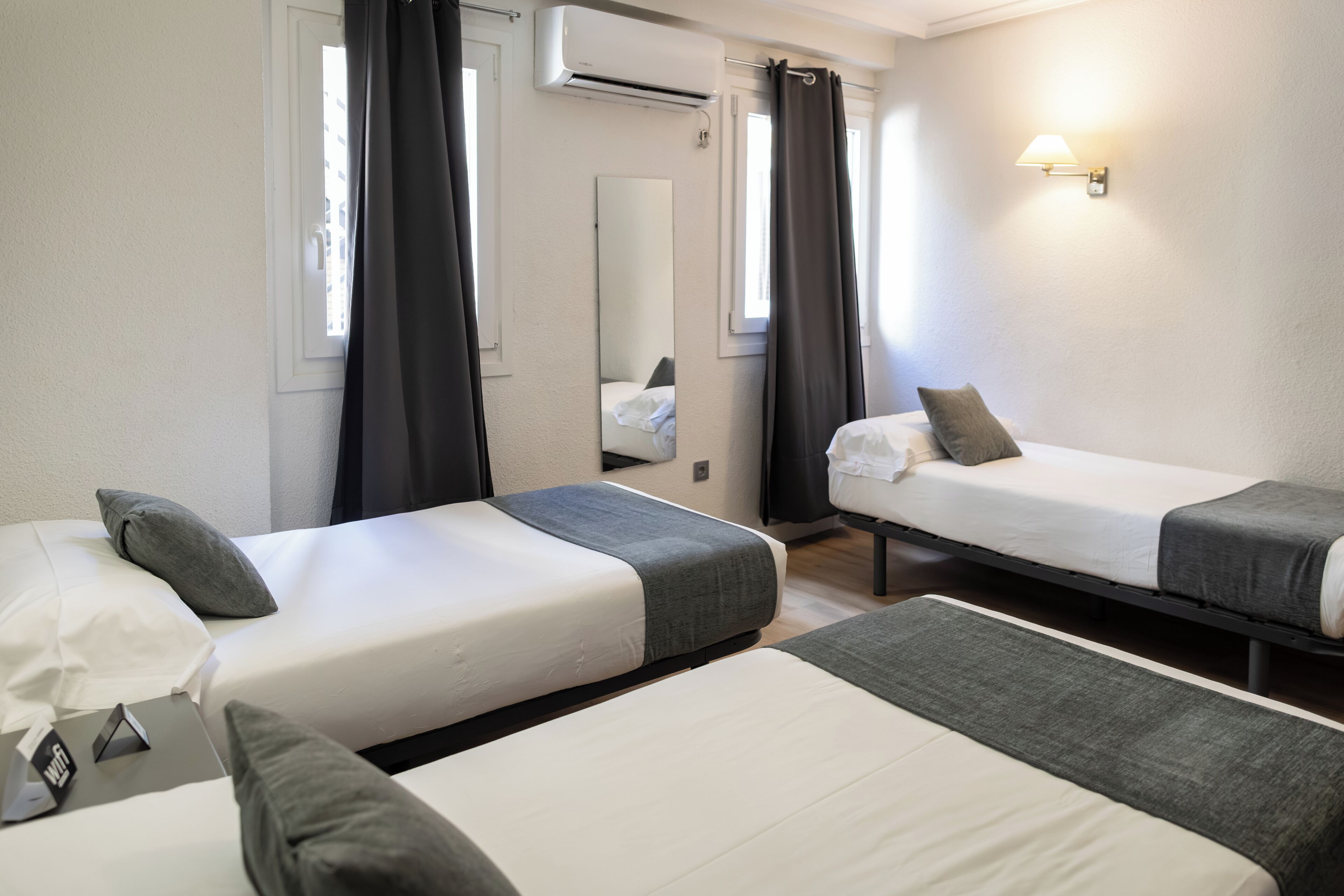 Triple Room | Blackout curtains, free WiFi, bed sheets