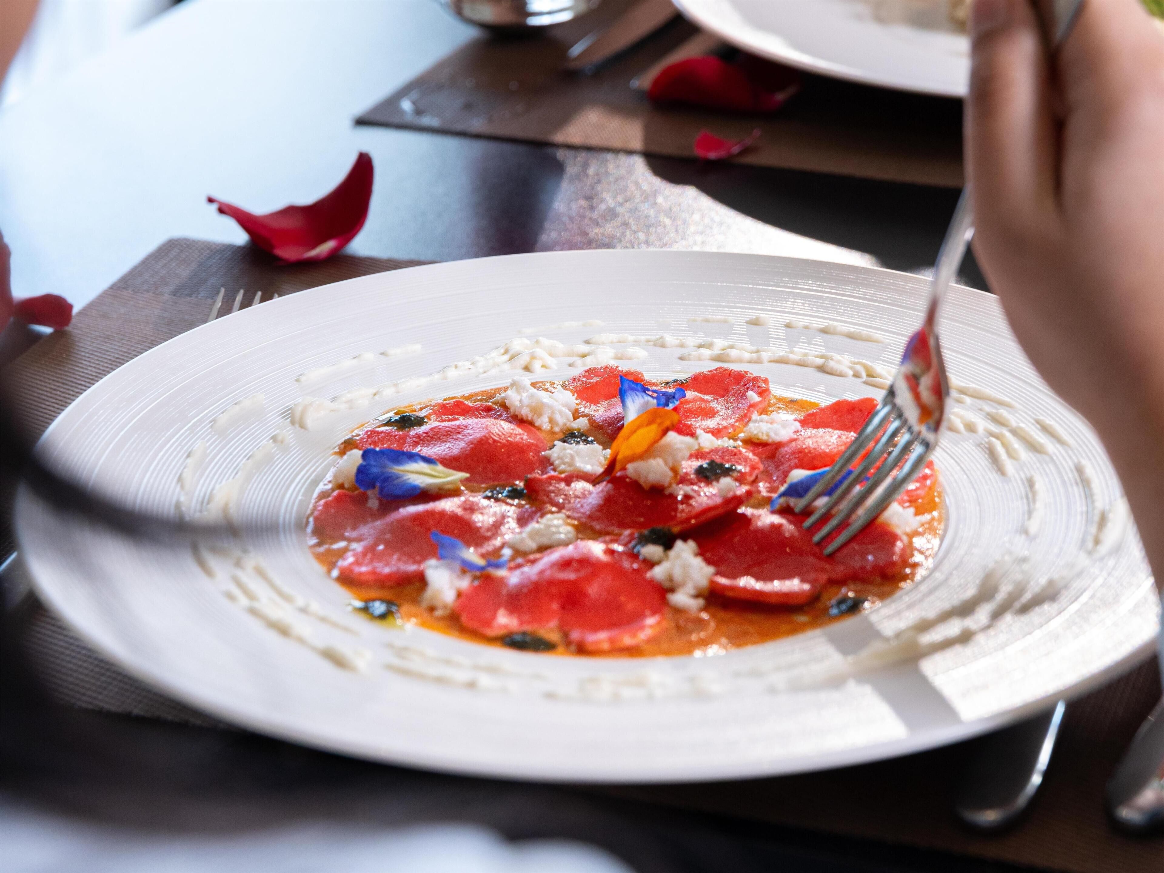 A plate of food with a fork on it.