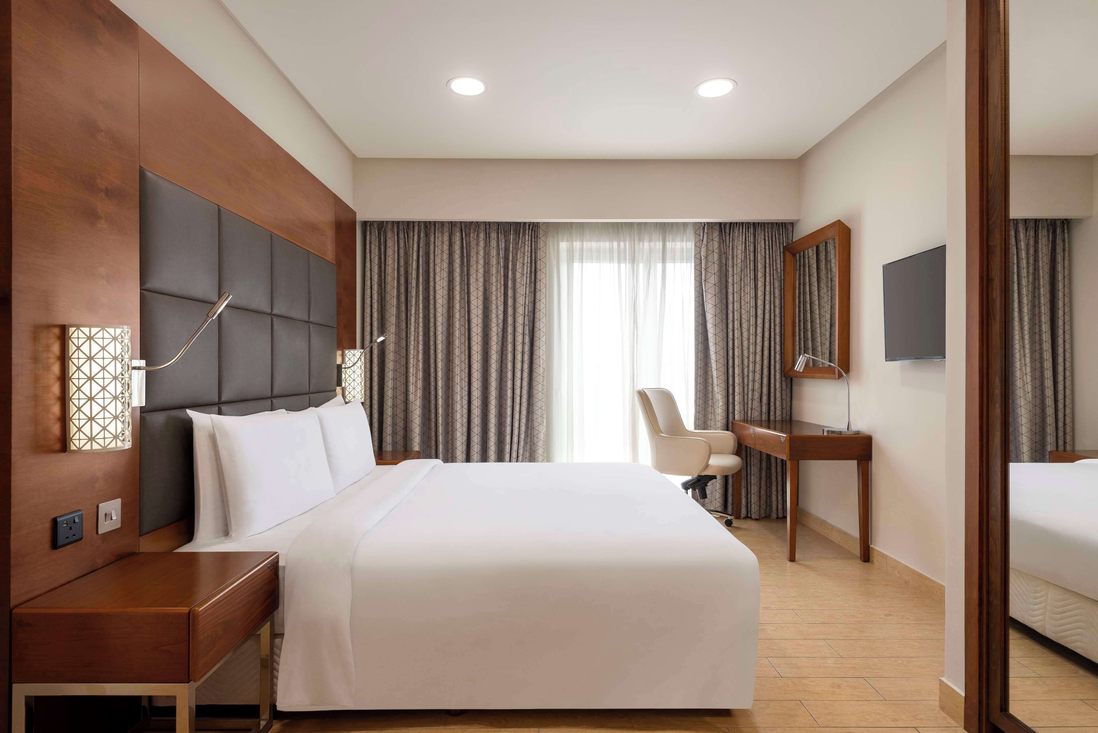 Apartment, 1 Bedroom | Hypo-allergenic bedding available, in-room safe, soundproofing