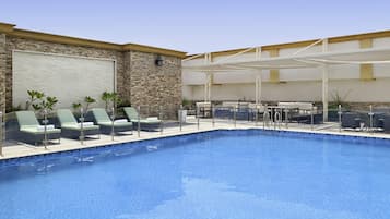 Outdoor pool, open 6:00 AM to 5:00 PM, pool umbrellas, sun loungers