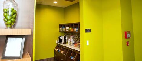 A food service area with a sign for 'The Pavilion Pantry' offering snacks and sundries.