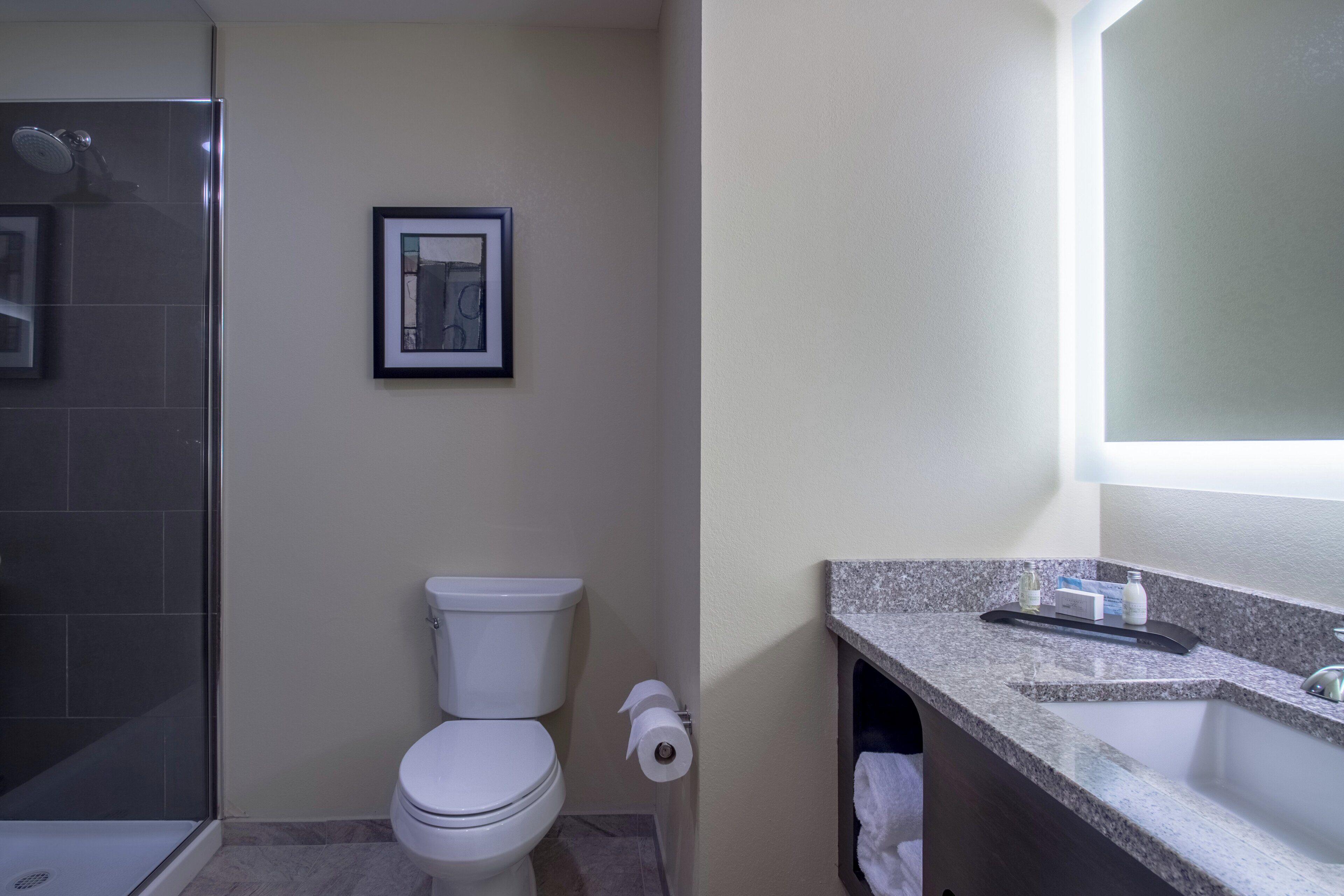 premium bedding, pillow-top beds, desk, laptop workspace