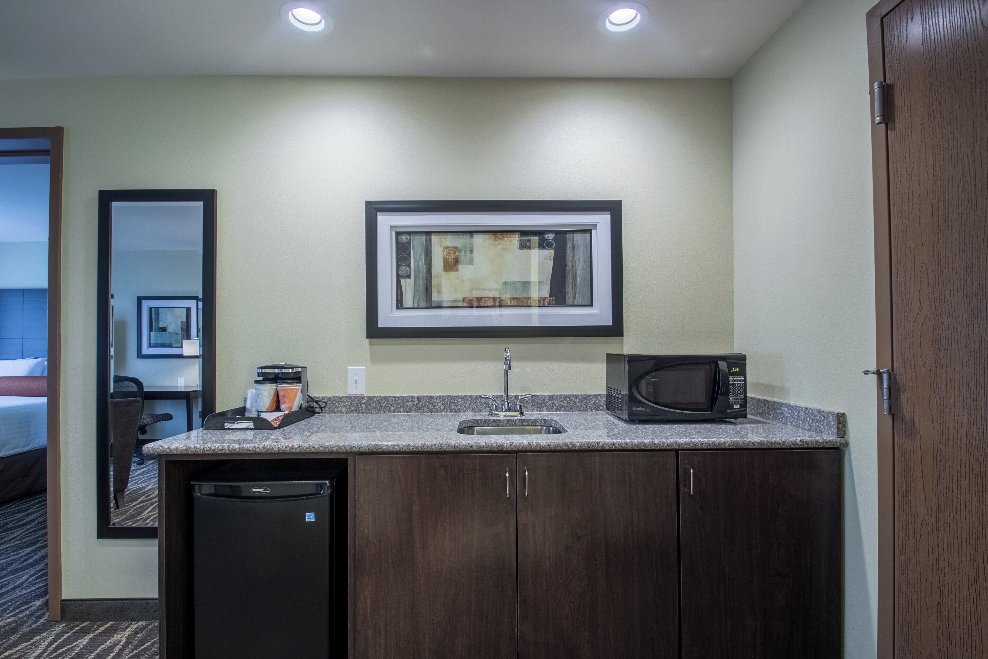 premium bedding, pillow-top beds, desk, laptop workspace