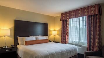 Premium bedding, pillow-top beds, desk, laptop workspace