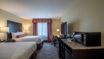 Premium bedding, pillow-top beds, desk, laptop workspace